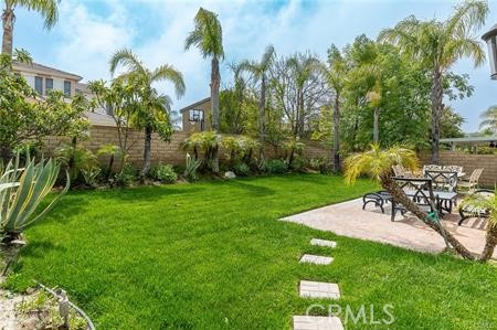 25724 Lewis Way Stevenson Ranch, CA 91381 - Photo 32 of 36 a view of a backyard with a patio
