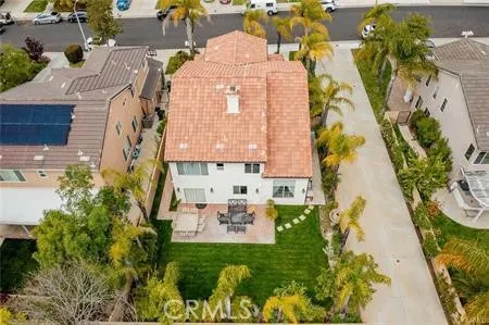 an aerial view of a residential apartment building with a yard
