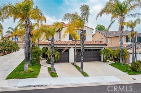 25724 Lewis Way Stevenson Ranch, CA 91381 - Photo 36 of 36 a front view of multi story residential apartment building with yard and sign board