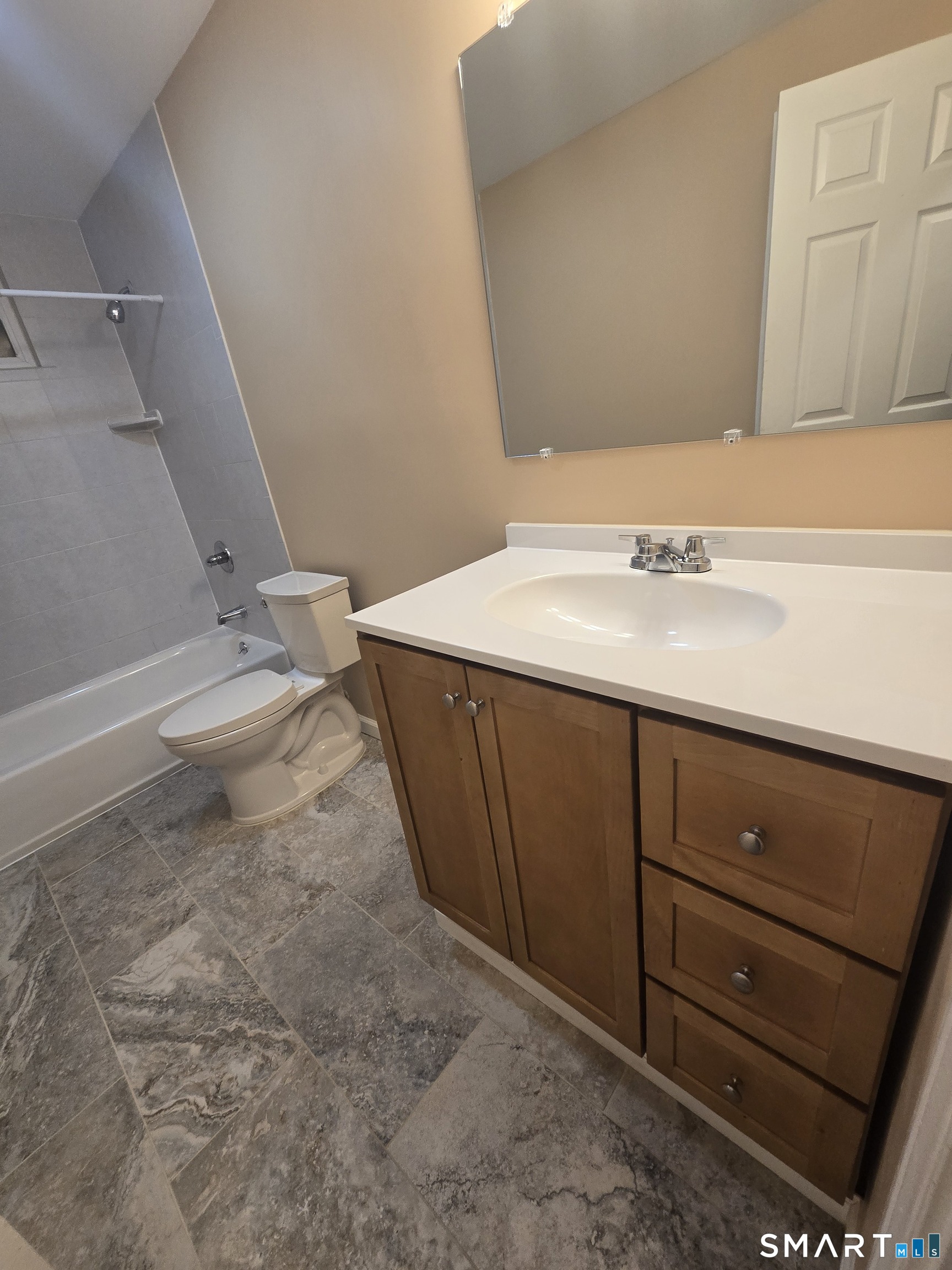 38 Burton Street Hartford, CT 06112 - Photo 15 of 18 a bathroom with a sink a toilet and a bathtub