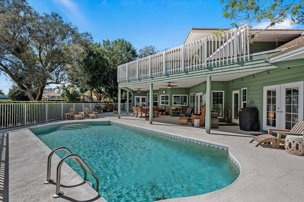 7 Alnwick Road Palm Beach Gardens, FL 33418 - Photo 30 of 47 Deck overlooks Pool and Golf Course