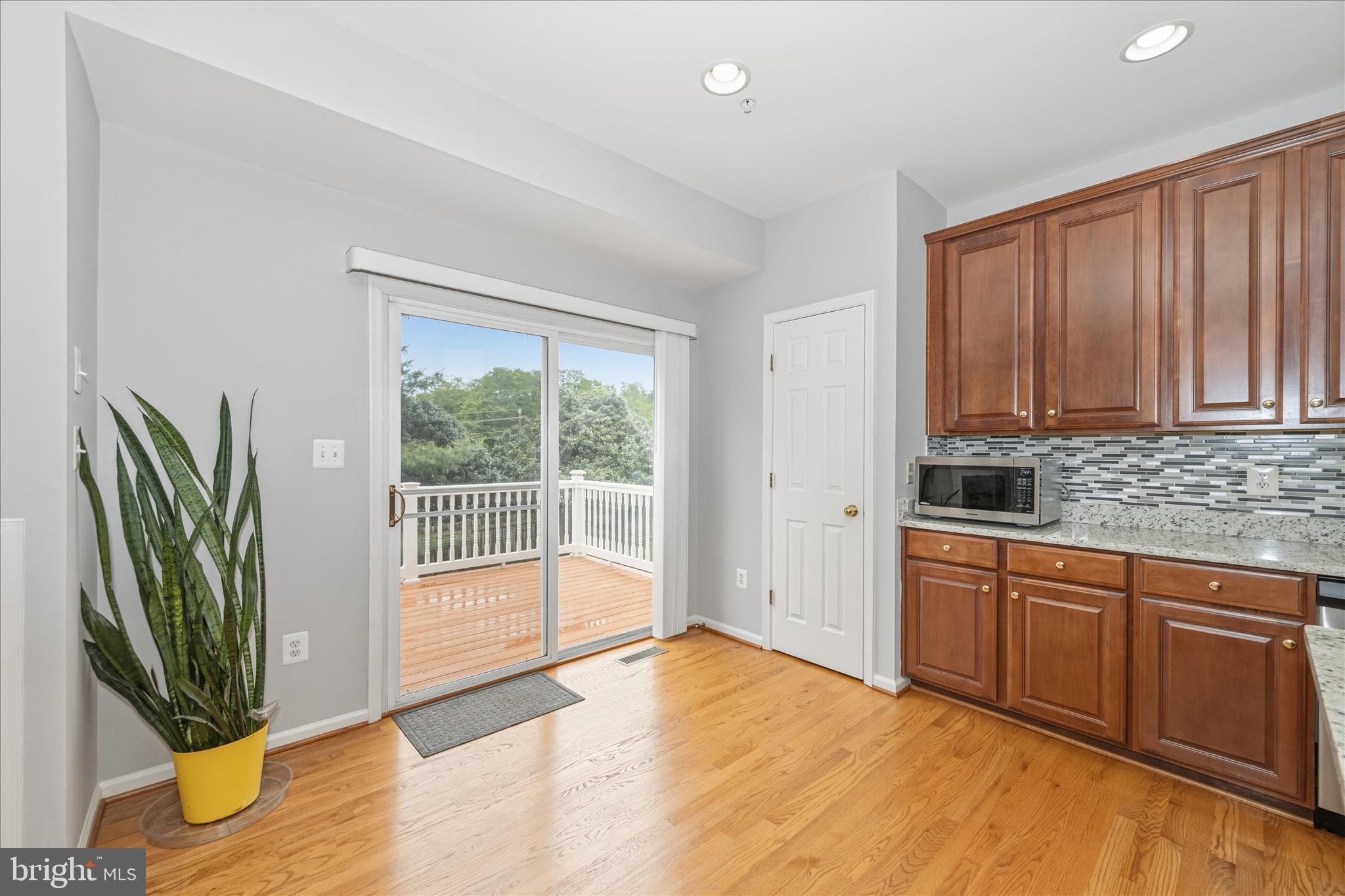 21 Inkberry Circle Gaithersburg, MD 20877 - Photo 21 of 51 a view of a kitchen with wooden floor and a sink