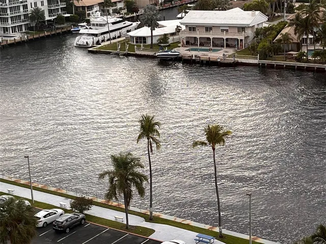 a view of swimming pool with outdoor seating