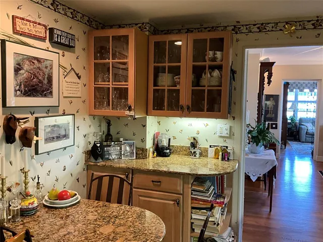 view of a entryway with furniture and wooden floor
