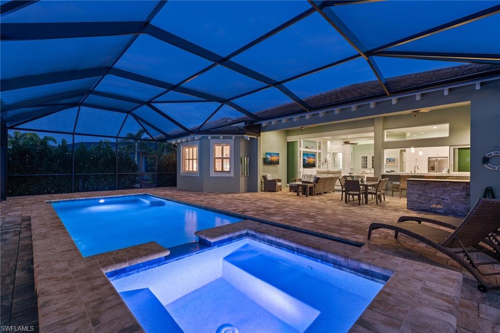 6391 Warwick Avenue Naples, FL 34113 - Photo 19 of 26 a room with pool table and windows