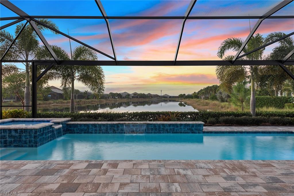 6391 Warwick Avenue Naples, FL 34113 - Photo 24 of 26 a view of outdoor space with swimming pool