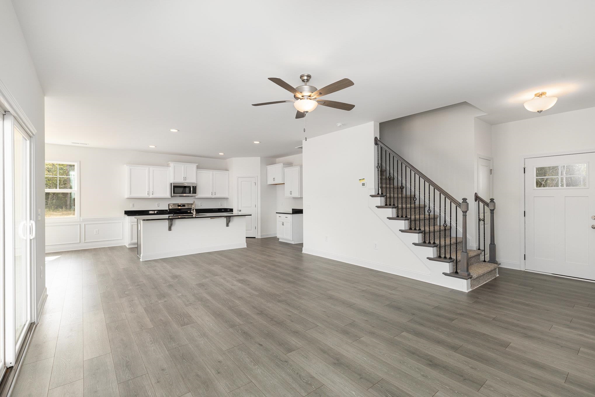 29 Bonnybrook Selma, NC 27576 - Photo 5 of 28 a view of kitchen with sink and wooden floor