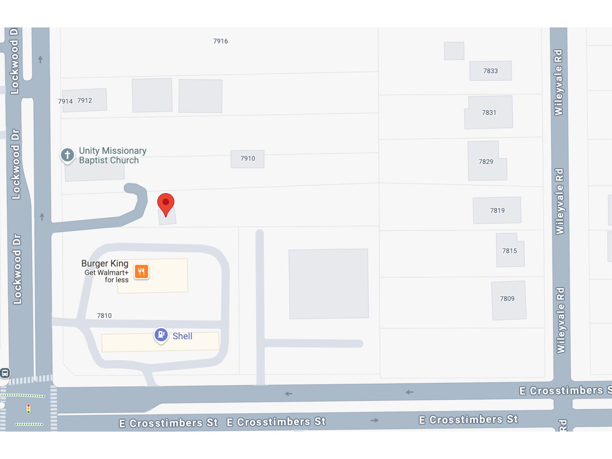 7902 Lockwood Drive Houston, TX 77016 - Photo 5 of 5 a utility room with a refrigerator and a window