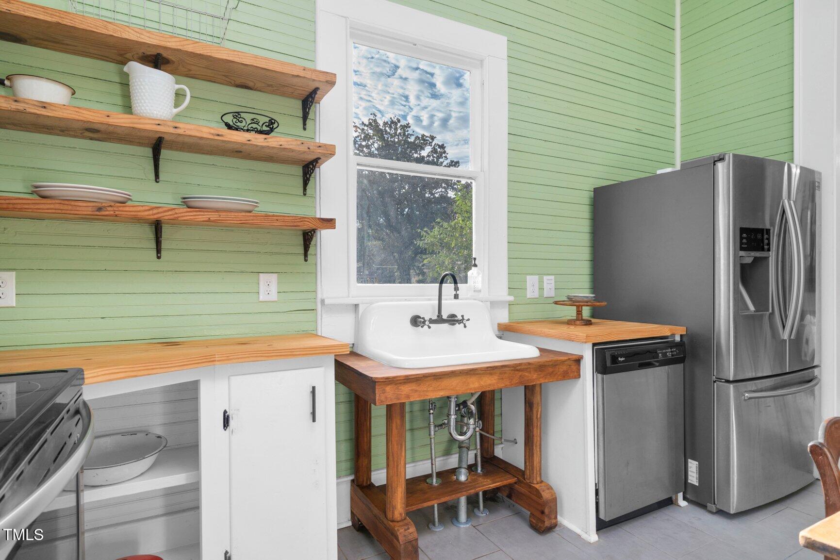 206 West Blalock Road Lucama, NC 27851 - Photo 12 of 35 a utility room with washer and dryer