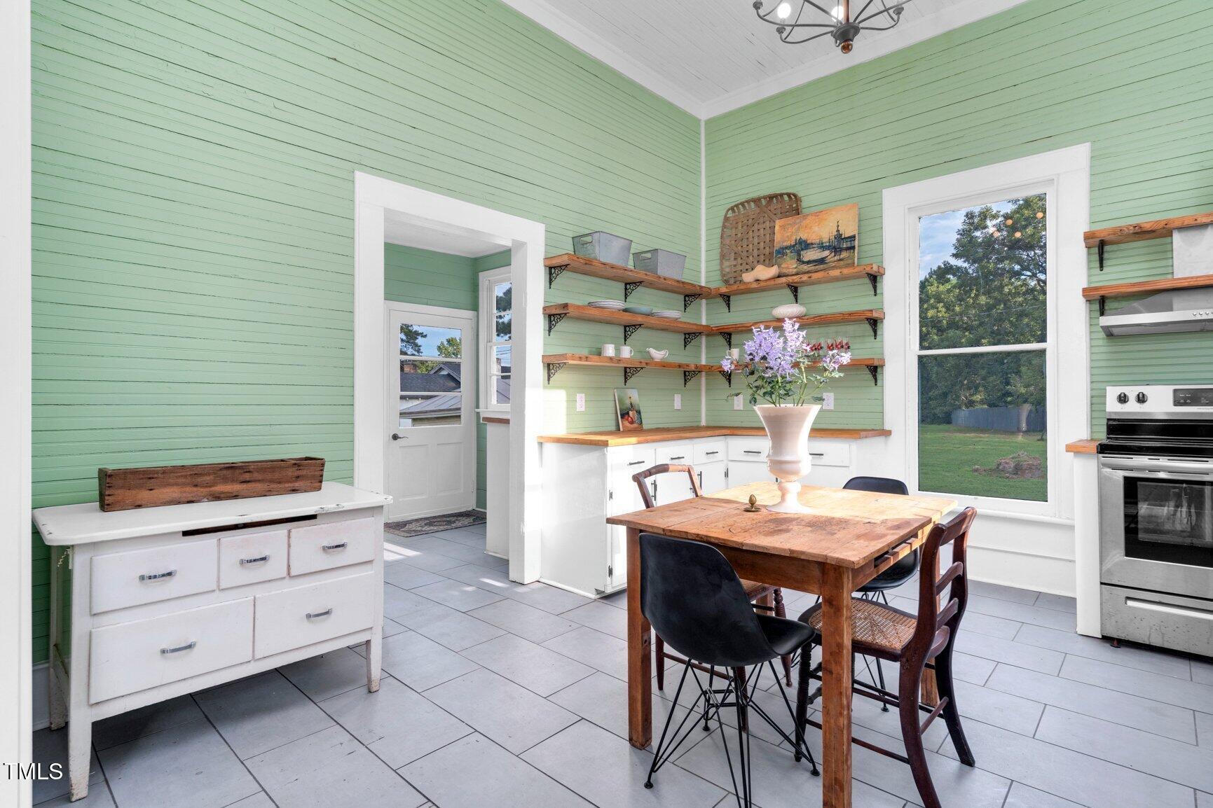 206 West Blalock Road Lucama, NC 27851 - Photo 15 of 35 a dining room with furniture and window