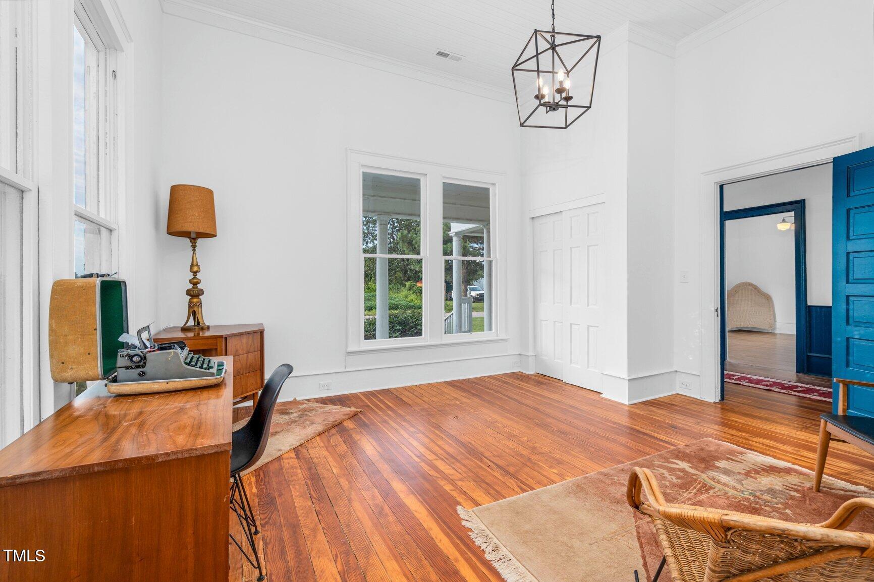 206 West Blalock Road Lucama, NC 27851 - Photo 23 of 35 a bedroom with a bed and window