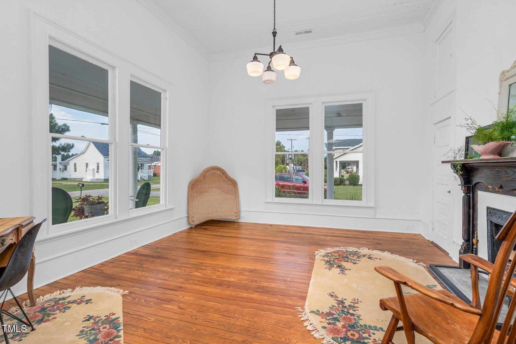 206 West Blalock Road Lucama, NC 27851 - Photo 24 of 35 a view of a bedroom with a bed and wooden floor