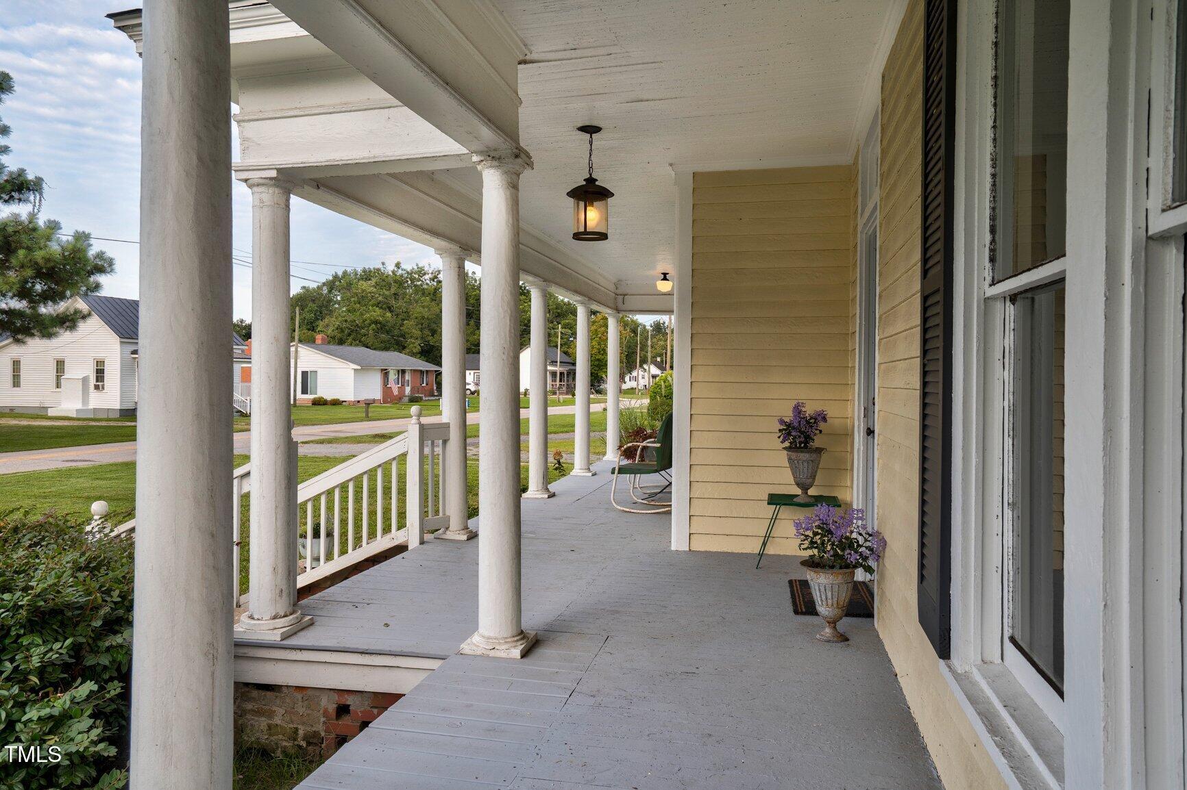 206 West Blalock Road Lucama, NC 27851 - Photo 5 of 35 a view of a porch with chairs