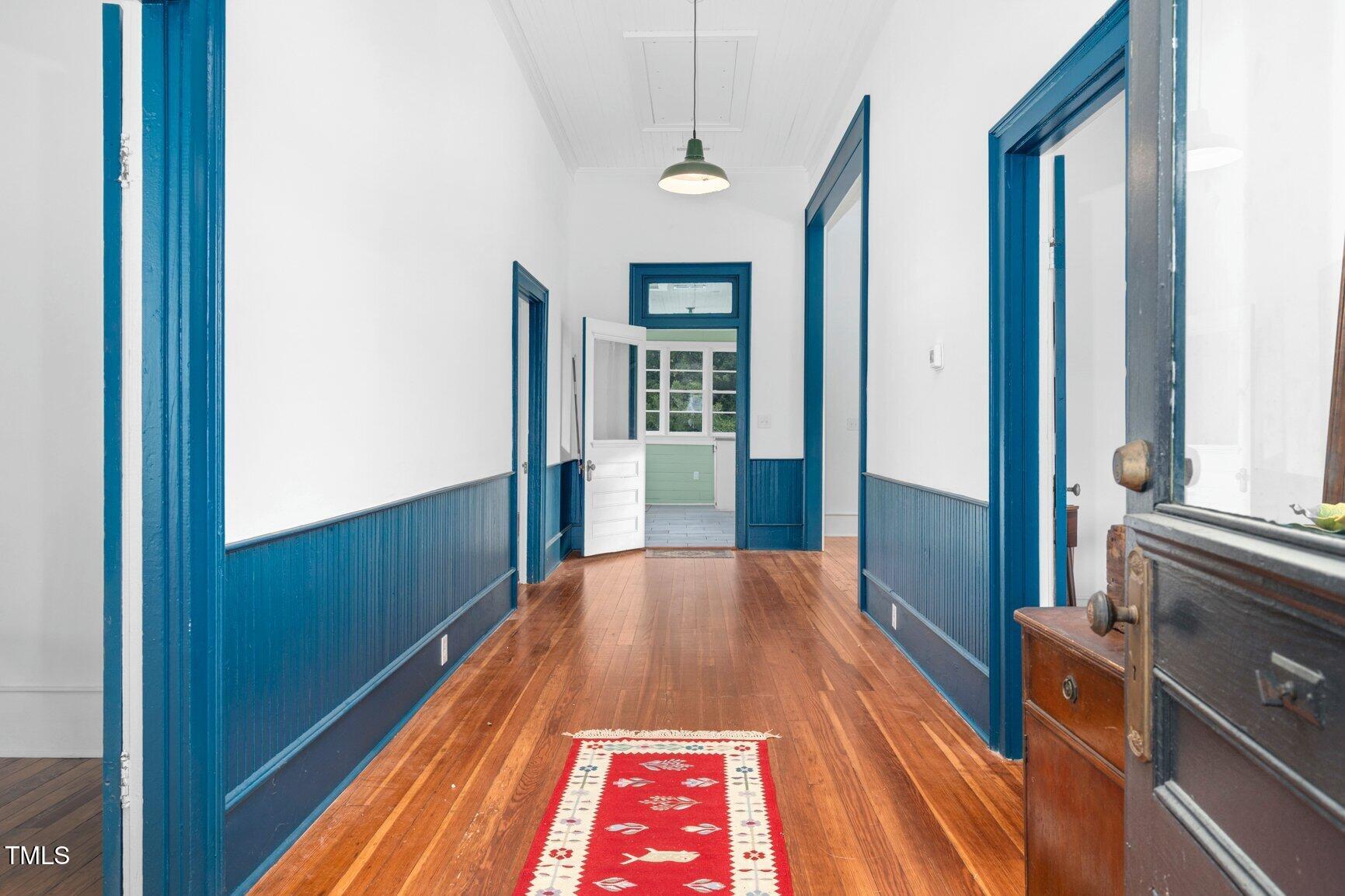 206 West Blalock Road Lucama, NC 27851 - Photo 6 of 35 a view of a hallway with wooden floor