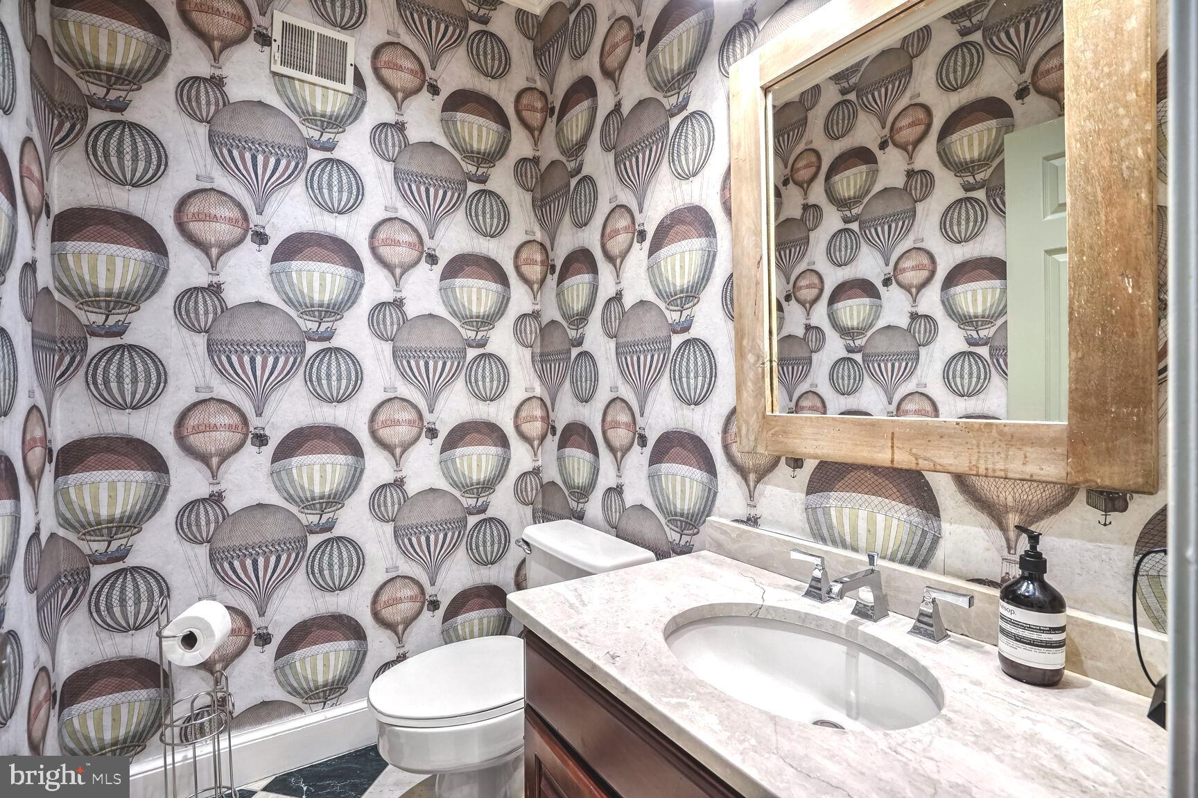 1222 Ranleigh Road McLean, VA 22101 - Photo 17 of 49 a bathroom with a sink and toilet