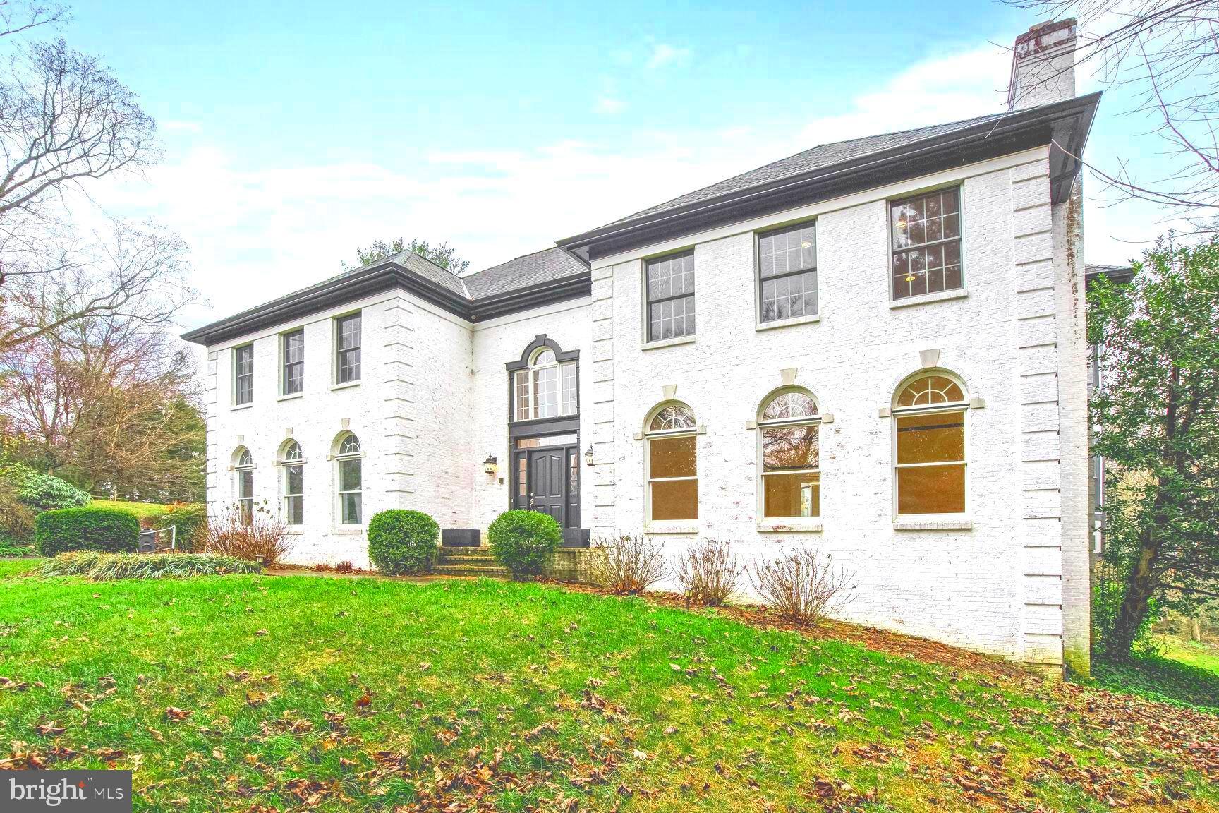 1222 Ranleigh Road McLean, VA 22101 - Photo 2 of 49 a front view of a house with garden