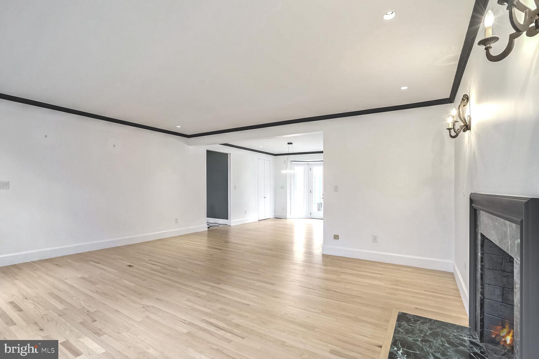 1222 Ranleigh Road McLean, VA 22101 - Photo 22 of 49 a view of an empty room with wooden floor and a window