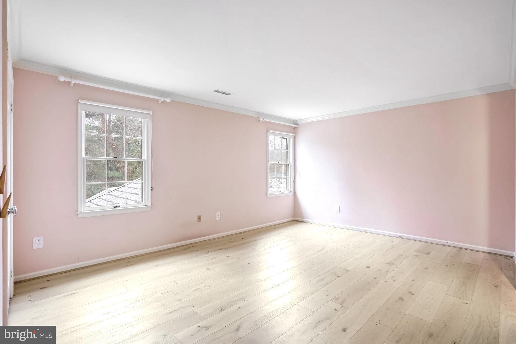 1222 Ranleigh Road McLean, VA 22101 - Photo 31 of 49 an empty room with wooden floor and windows