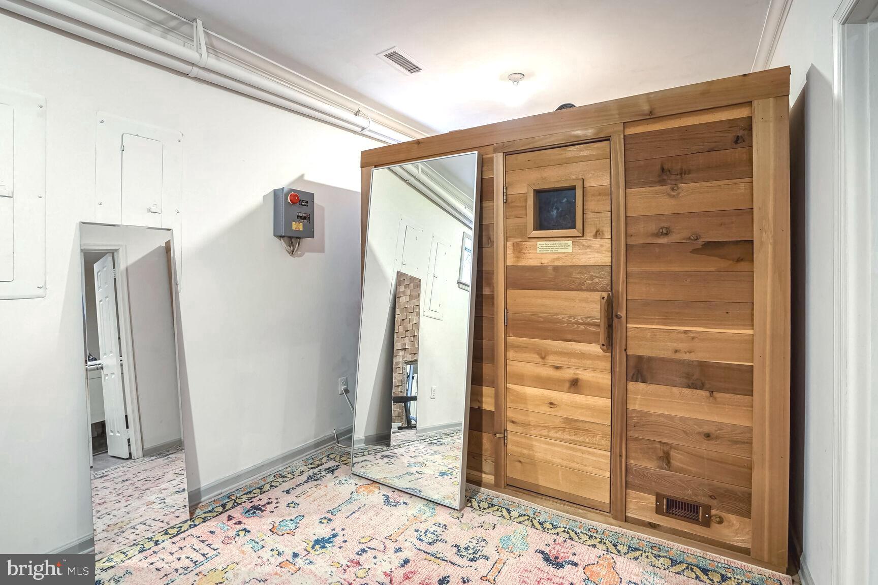 1222 Ranleigh Road McLean, VA 22101 - Photo 38 of 49 a bathroom with a shower and a glass door