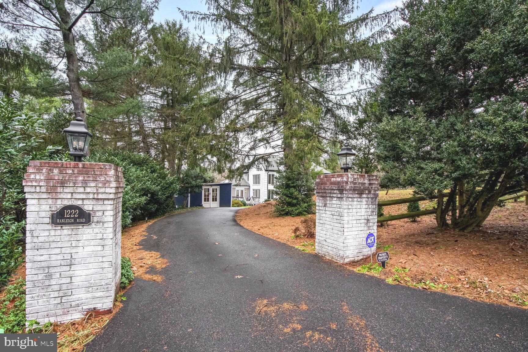 1222 Ranleigh Road McLean, VA 22101 - Photo 41 of 49 a tall building with trees in front of it