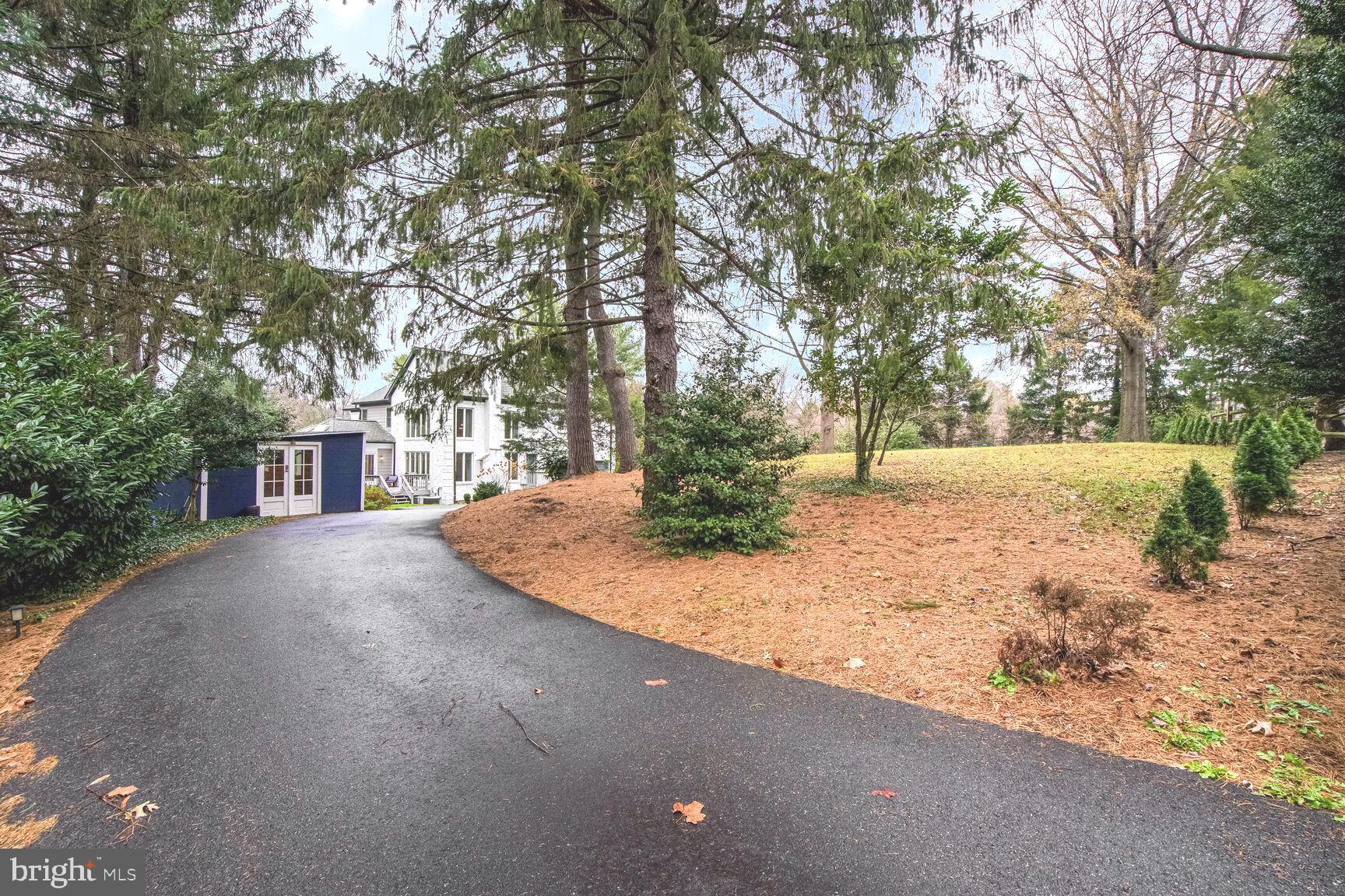1222 Ranleigh Road McLean, VA 22101 - Photo 42 of 49 a view of a tree in front of a house