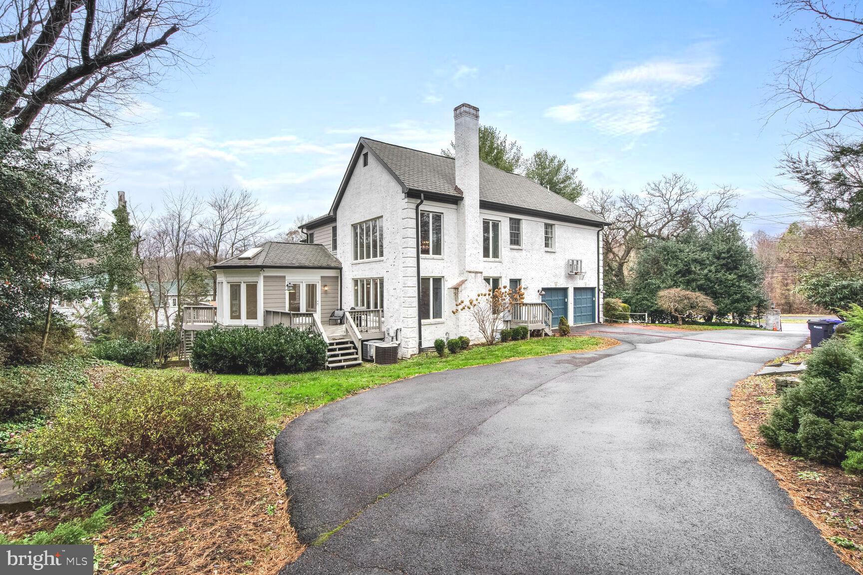 1222 Ranleigh Road McLean, VA 22101 - Photo 43 of 49 a view of a house with a yard and large tree