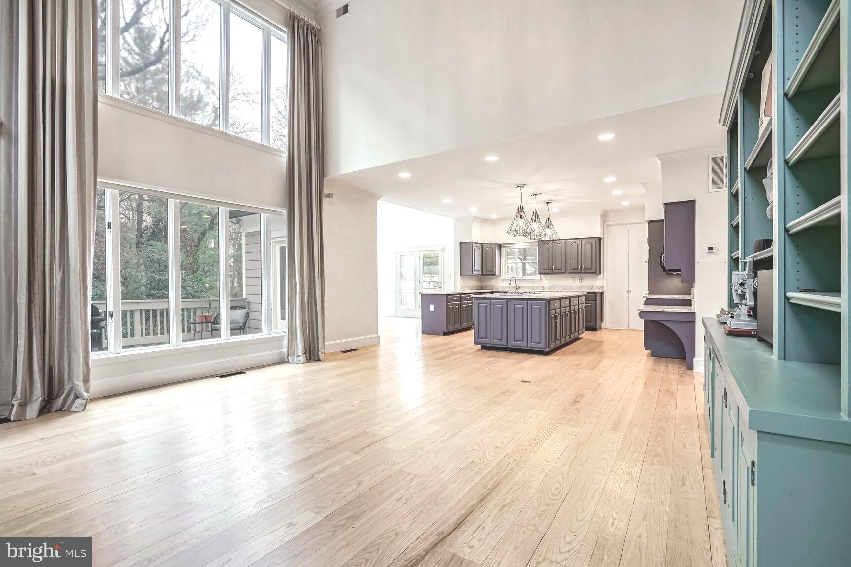 1222 Ranleigh Road McLean, VA 22101 - Photo 5 of 49 a view of a big room with wooden floor and windows