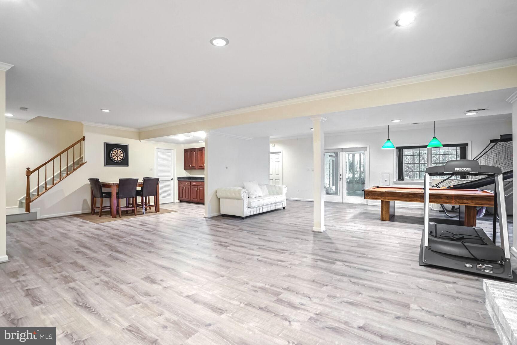 1222 Ranleigh Road McLean, VA 22101 - Photo 8 of 49 a living room with furniture and wooden floor next to a window