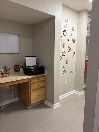 a kitchen with stainless steel appliances a refrigerator and sink