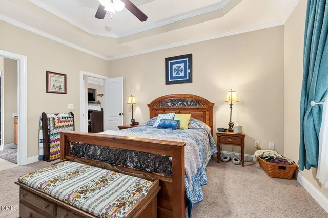 a bed room with a bed and a table