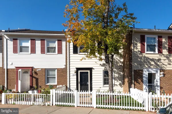 a front view of a house with a porch