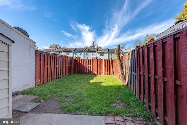 a view of a backyard with garden