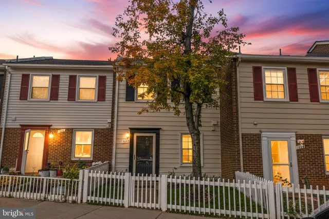 a front view of a house with a porch