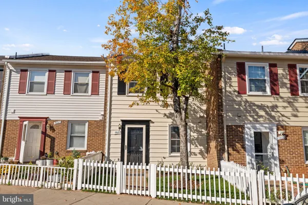 a front view of a house with a porch