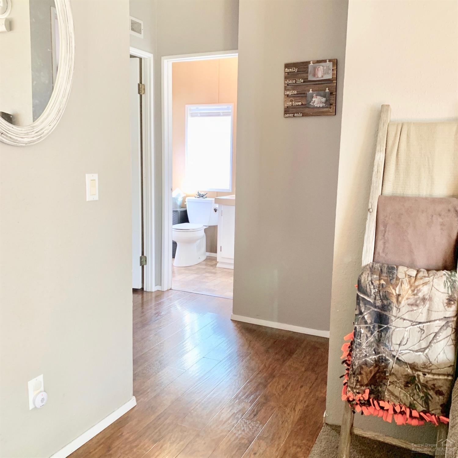 703 Center Ridge Drive Culver, OR 97734 - Photo 20 of 22 Hallway to guest bedrooms & guest ba