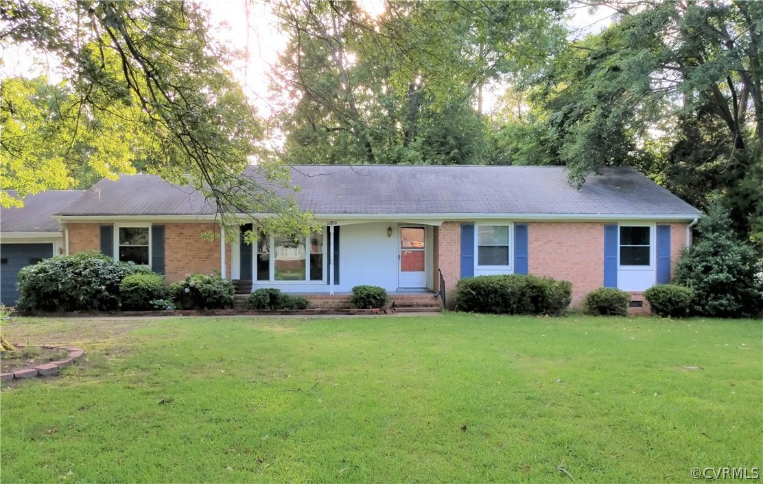 10830 Weybridge Road Chester, VA 23831 - Photo 1 of 33 a view of a house with a yard and green space