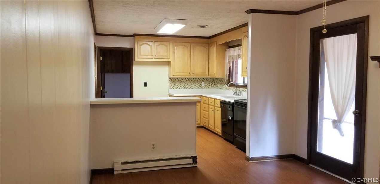 10830 Weybridge Road Chester, VA 23831 - Photo 11 of 33 a kitchen with a refrigerator and a sink