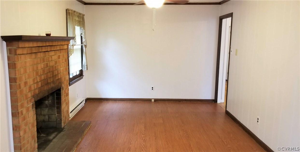 10830 Weybridge Road Chester, VA 23831 - Photo 16 of 33 a view of a hallway with wooden floor