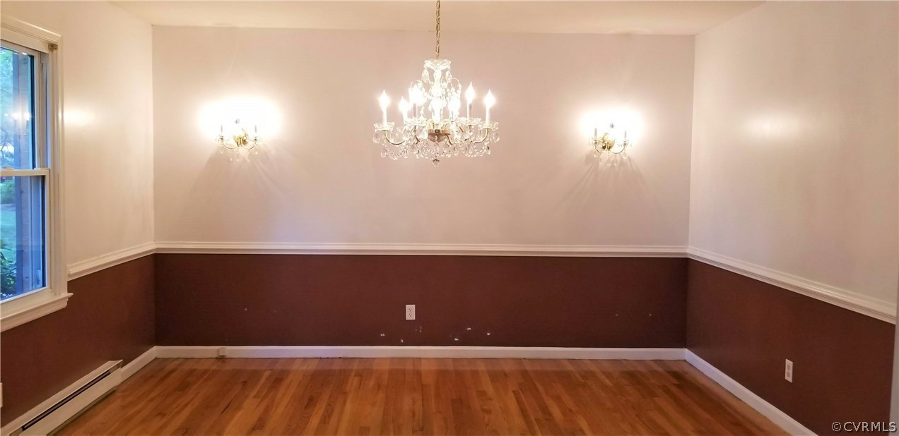 10830 Weybridge Road Chester, VA 23831 - Photo 21 of 33 a view of wooden floor and windows in a room