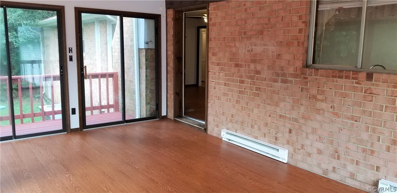 10830 Weybridge Road Chester, VA 23831 - Photo 33 of 33 a view of empty room with floor to ceiling window