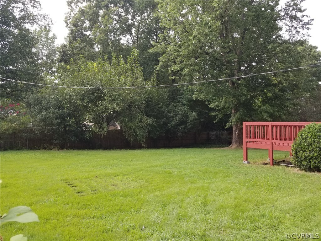 10830 Weybridge Road Chester, VA 23831 - Photo 6 of 33 a view of a bench in backyard of house