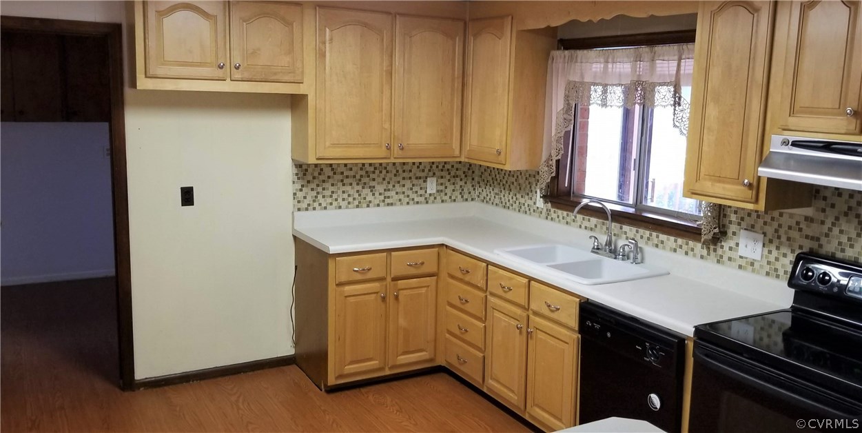 10830 Weybridge Road Chester, VA 23831 - Photo 8 of 33 a kitchen with a sink and cabinets