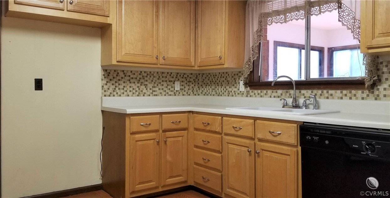 10830 Weybridge Road Chester, VA 23831 - Photo 9 of 33 a bathroom with a sink and a mirror