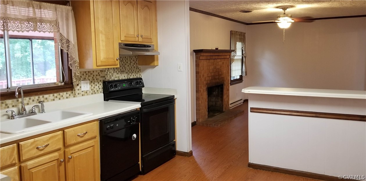 10830 Weybridge Road Chester, VA 23831 - Photo 10 of 33 a kitchen with a refrigerator and a sink