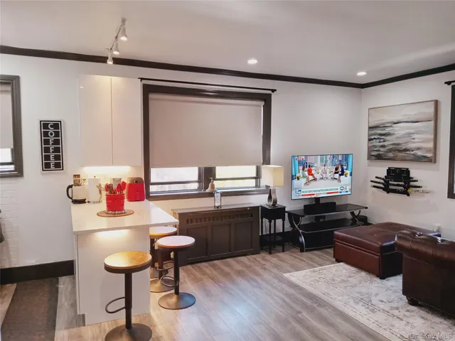 a room with furniture and a window