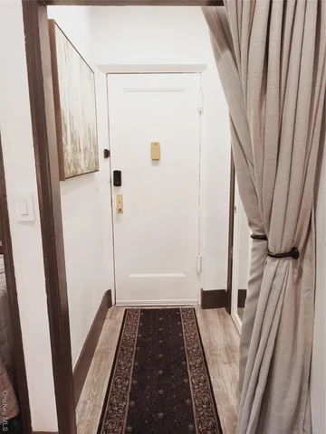 a view of a closet from a balcony