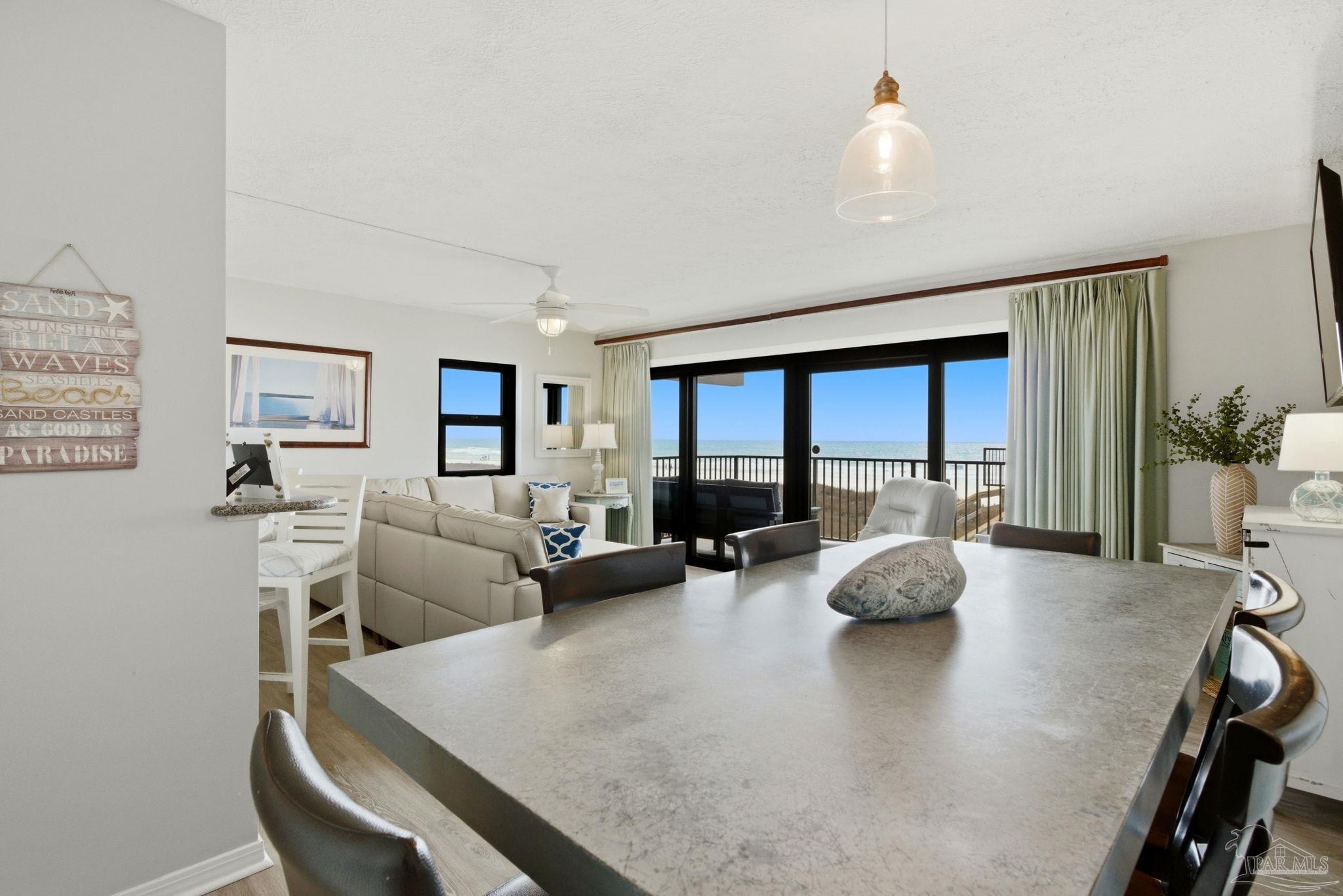 14623 Perdido Key Drive, Unit W201 Perdido Key, FL 32507 - Photo 18 of 57 a living room with furniture and a large window