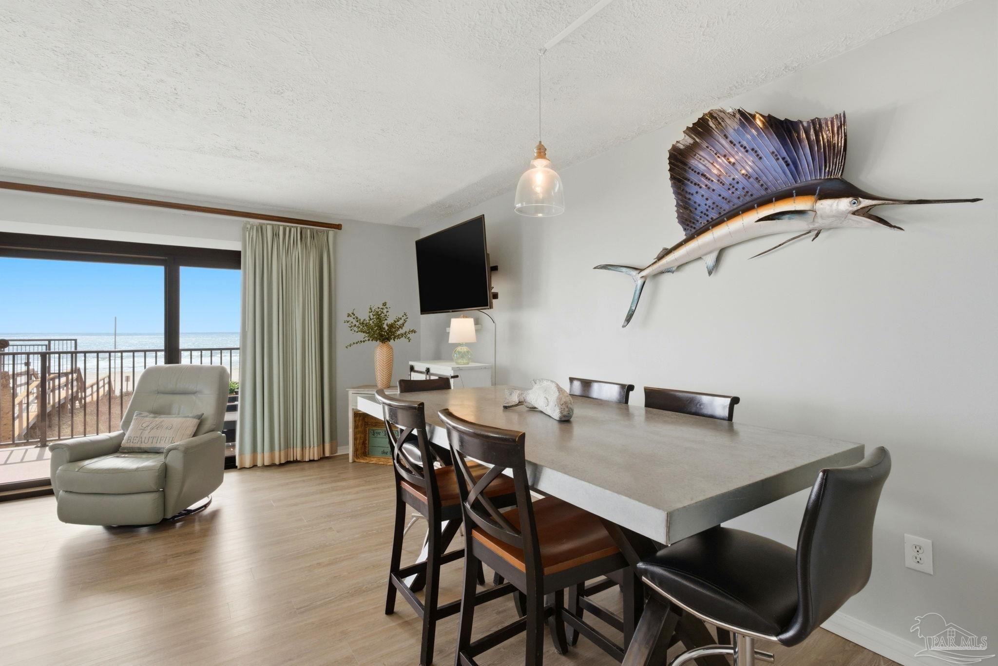 14623 Perdido Key Drive, Unit W201 Perdido Key, FL 32507 - Photo 19 of 57 a view of a livingroom with furniture and a flat screen tv