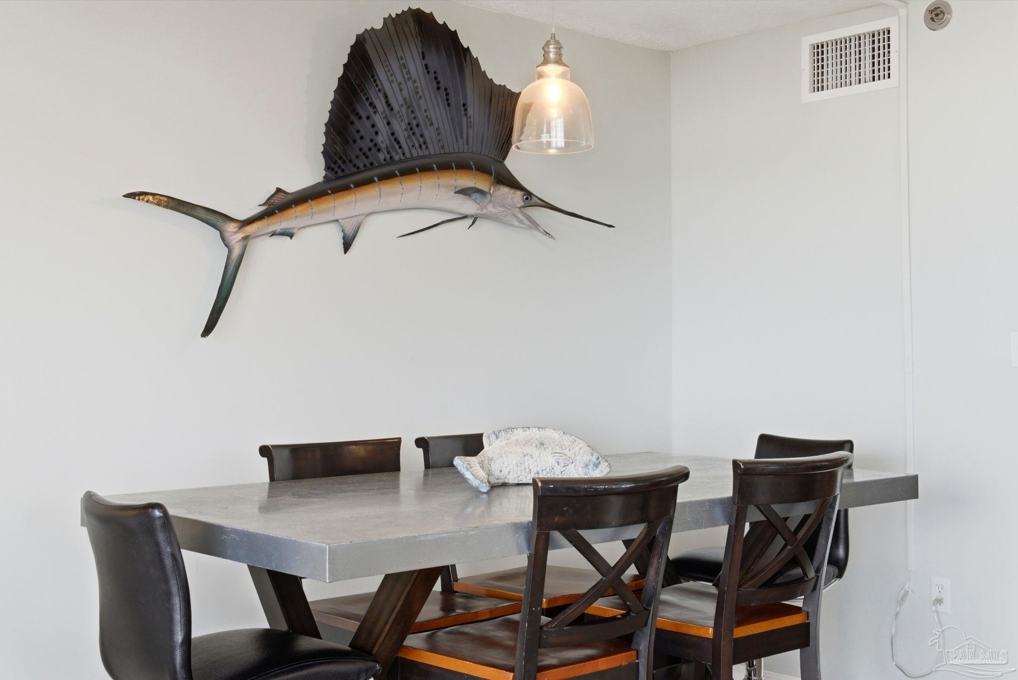 14623 Perdido Key Drive, Unit W201 Perdido Key, FL 32507 - Photo 20 of 57 a view of a dining room with furniture and wooden floor