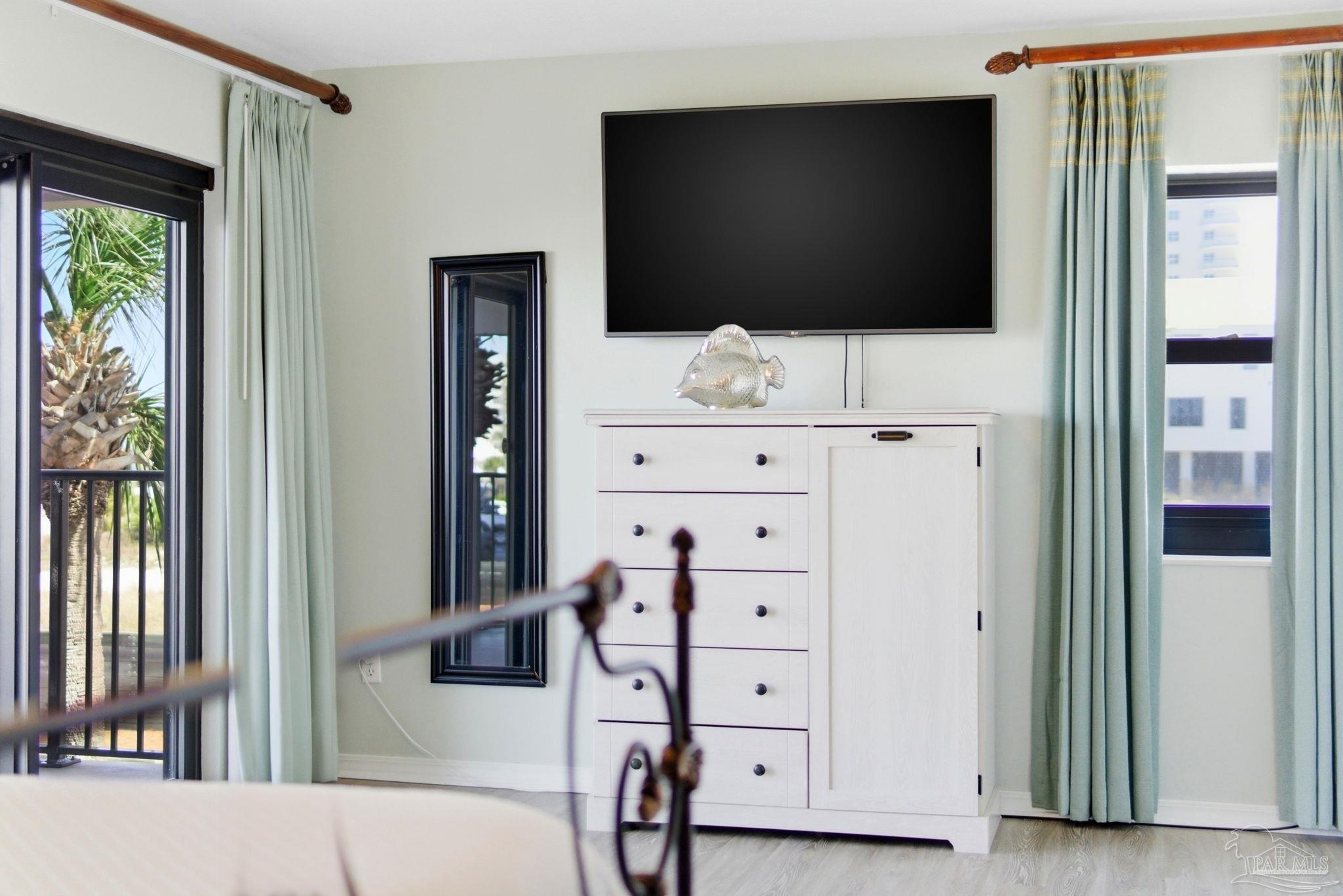 14623 Perdido Key Drive, Unit W201 Perdido Key, FL 32507 - Photo 28 of 57 a living room with flat screen tv